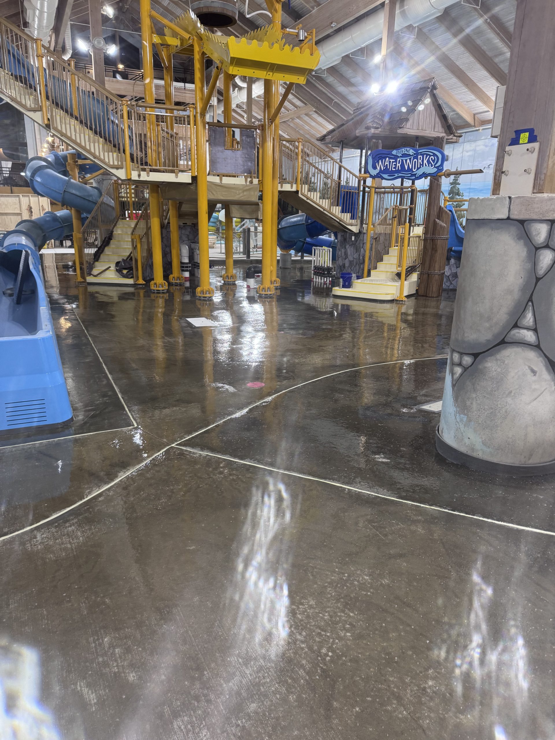 Vapor Barrier Primer(1) Vapor barrier primer added to a concrete floor of an indoor water park playground.